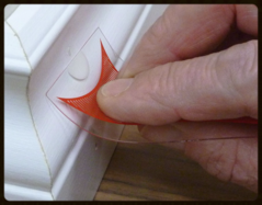 Hand holding transparent Clear Swipe tool